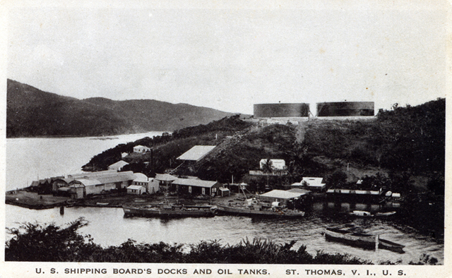 Coal barges approaching the U.S. Navy operations on Hassel Island (circa 1920), previous site of the Hamburg American Line depot